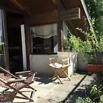 Di -